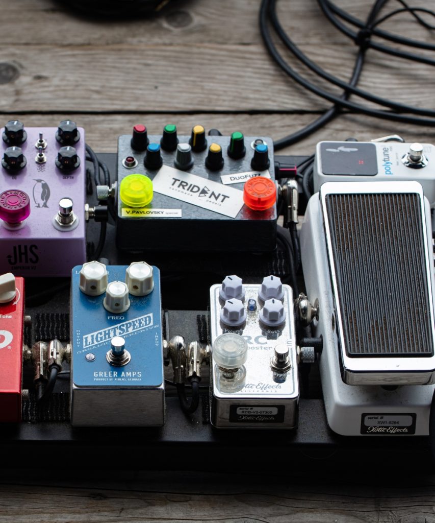 Various guitar pedals on a pedal board